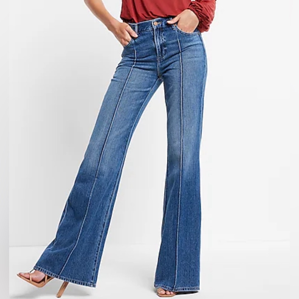 Flare express jeans with pin tuck up the front.